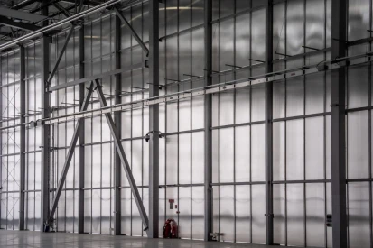 Górnośląskie Towarzystwo Lotnicze S.A. - Hangar serwisowy do obsługi samolotów.