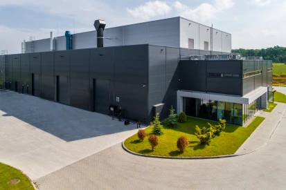 PIONART - <a href="https://www.promus.com.pl/en/offer/general-contracting/design-and-construction-steel-halls">Warehouse hall</a>, galvanizing plant hall with social and office facilities