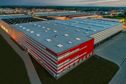 Polcar - Four-storey <a href="https://www.promus.com.pl/en/offer/general-contracting/design-and-construction-steel-halls">warehouse hall</a>