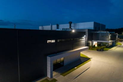 PIONART - <a href="https://www.promus.com.pl/en/offer/general-contracting/design-and-construction-steel-halls">Warehouse hall</a>, galvanizing plant hall with social and office facilities