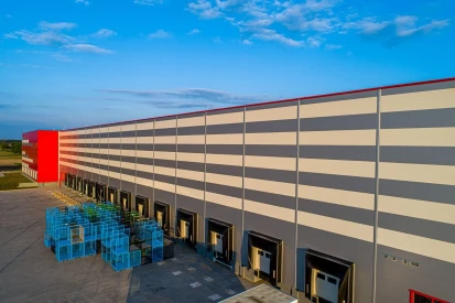 Polcar - Four-storey <a href="https://www.promus.com.pl/en/offer/general-contracting/design-and-construction-steel-halls">warehouse hall</a>