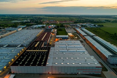 Polcar - Four-storey <a href="https://www.promus.com.pl/en/offer/general-contracting/design-and-construction-steel-halls">warehouse hall</a>