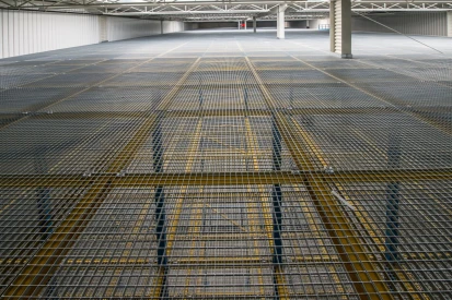 Polcar - Four-storey <a href="https://www.promus.com.pl/en/offer/general-contracting/design-and-construction-steel-halls">warehouse hall</a>