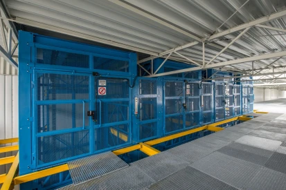 Polcar - Four-storey <a href="https://www.promus.com.pl/en/offer/general-contracting/design-and-construction-steel-halls">warehouse hall</a>