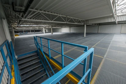 Polcar - Four-storey <a href="https://www.promus.com.pl/en/offer/general-contracting/design-and-construction-steel-halls">warehouse hall</a>