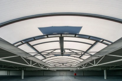 Polcar - Four-storey <a href="https://www.promus.com.pl/en/offer/general-contracting/design-and-construction-steel-halls">warehouse hall</a>