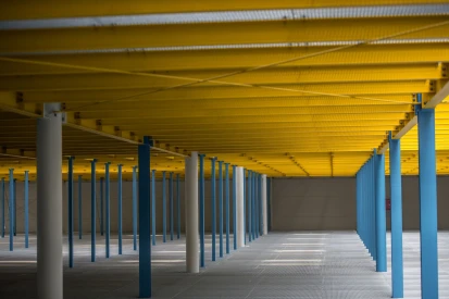 Polcar - Four-storey <a href="https://www.promus.com.pl/en/offer/general-contracting/design-and-construction-steel-halls">warehouse hall</a>