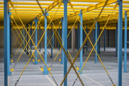 Polcar - Four-storey <a href="https://www.promus.com.pl/en/offer/general-contracting/design-and-construction-steel-halls">warehouse hall</a>